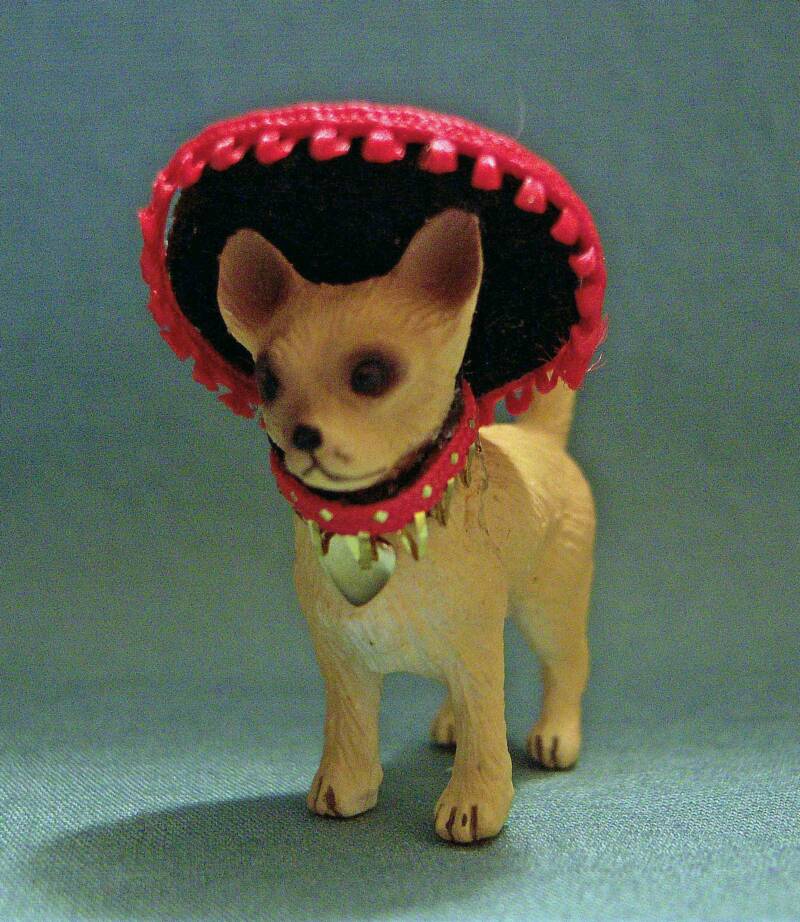 dollhouse chihuahua in sombrero and collar