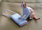 dollhouse cat with scratching board