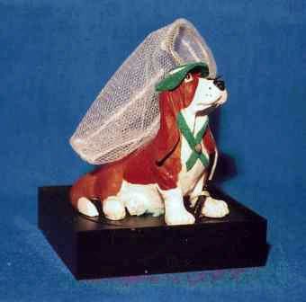 dollhouse basset hound with butterfly net and hat
