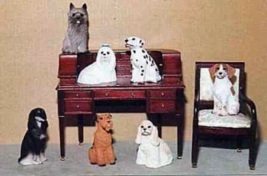 dollhouse dogs on miniature desk