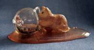 dollhouse cat with spilled fishbowl